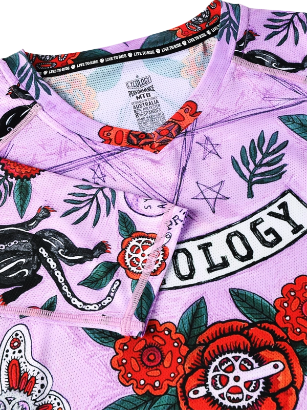 Women's Long-sleeve MTB Jersey with colorful floral and panther design on a purple background