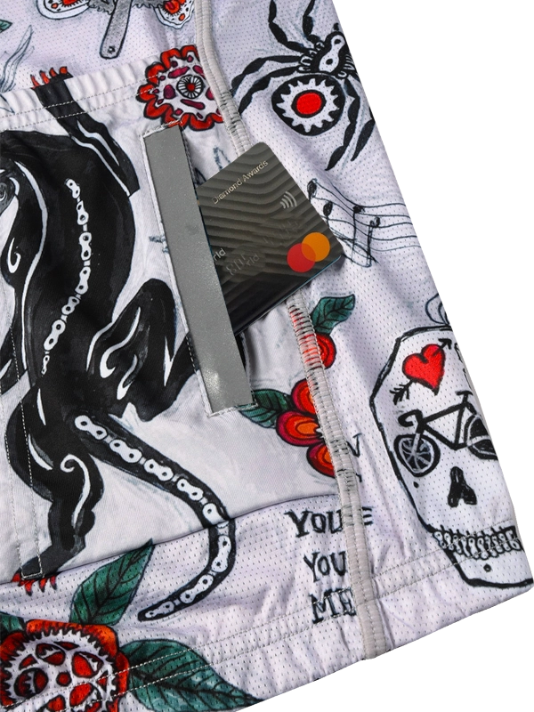 Long-sleeve cycling jersey with floral and panther design on a grey background back pockets