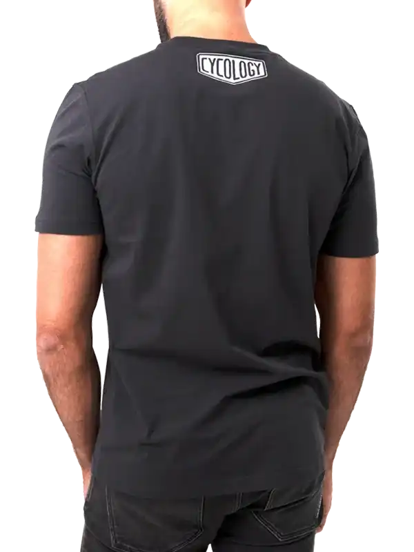Black men's cycling t-shirt with white Cycology logo on back, ideal for bike rides and active wear.