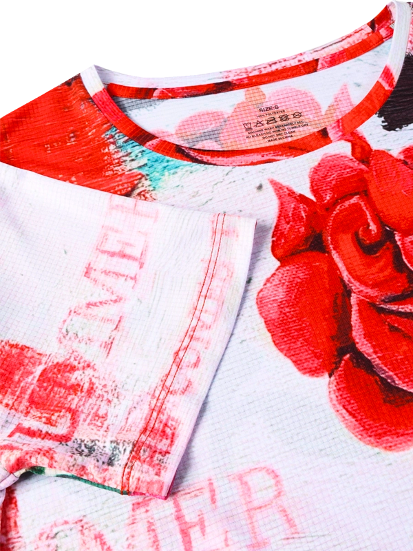 Women's Tech T-shirt with red and pink rose design on a white background