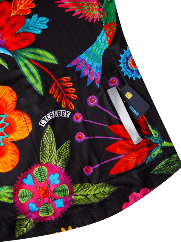 Colorful floral-patterned women's cycling jersey on a black background