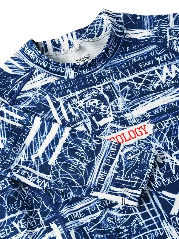 Blue cycling jersey with white graffiti-style graphics and 'Cycology' logo, designed for men's and women's rides.