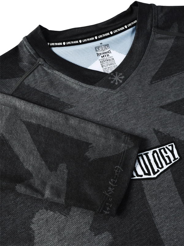 Black and gray long-sleeve MTB cycling jersey with Cycology logo on the front