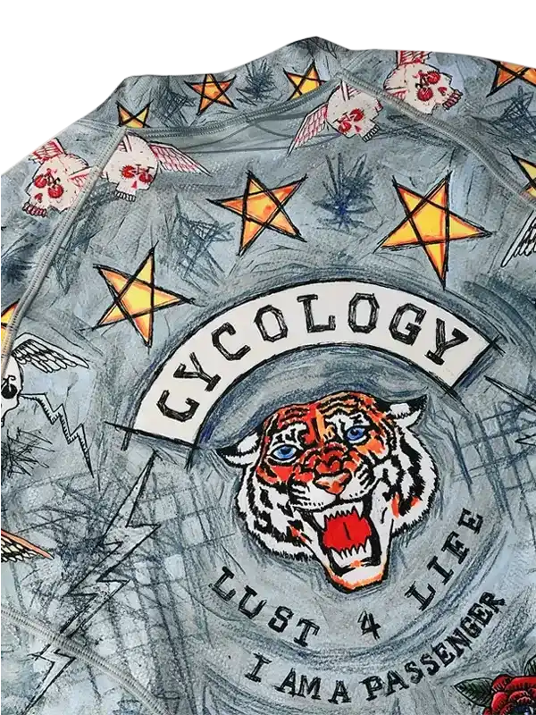 Cycling jersey with tiger graphic, stars, skulls, and 'Cycology' logo on gray fabric