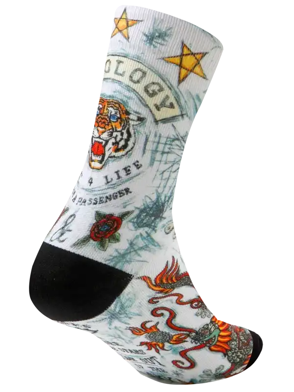 White cycling sock with tiger, dragon, stars, and tattoo-style graphics for men and women