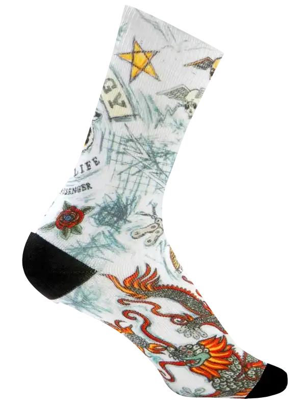 Men's cycling sock with dragon, star, and tattoo-style graphics on white background