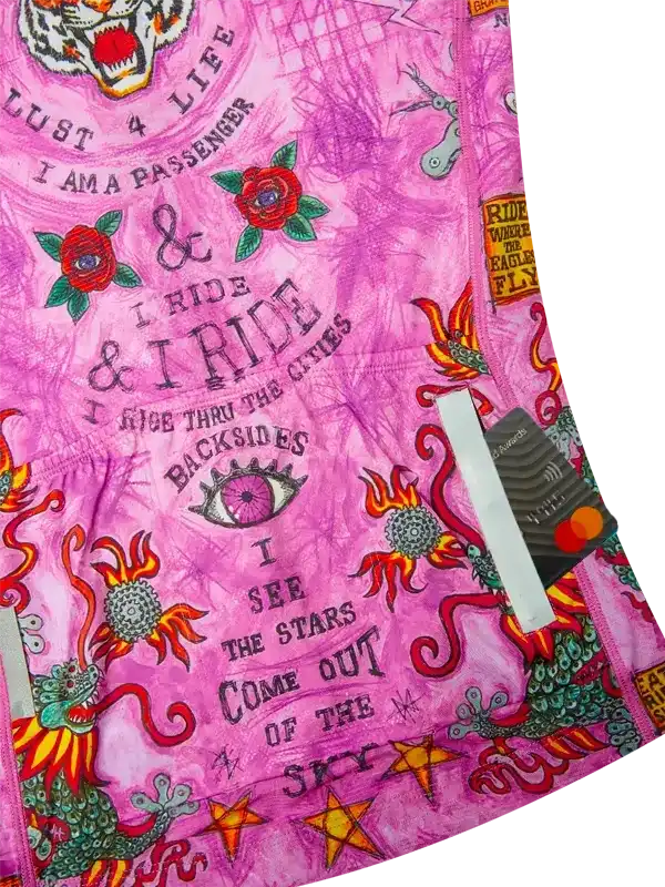 Pink cycling jersey with bold graphics, dragons, roses, and ride-themed text for men's & women's bike wear