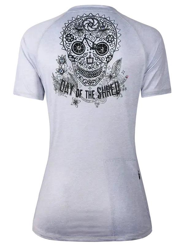 Women's cycling jersey with sugar skull and 'Day of the Shred' graphic, lightweight performance fabric