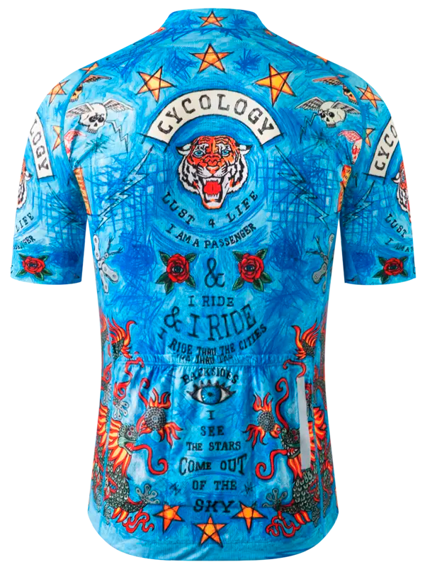 Blue cycling jersey with tattoos and text design, featuring the brand 'Cycology'.