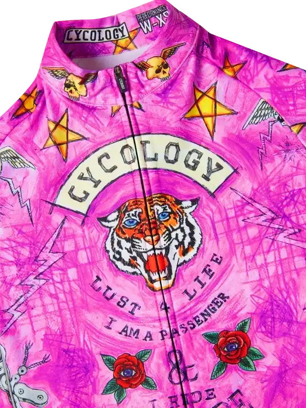 Vibrant pink cycling jersey with tiger, stars, roses, and 'Cycology' graphic print for men's and women's rides