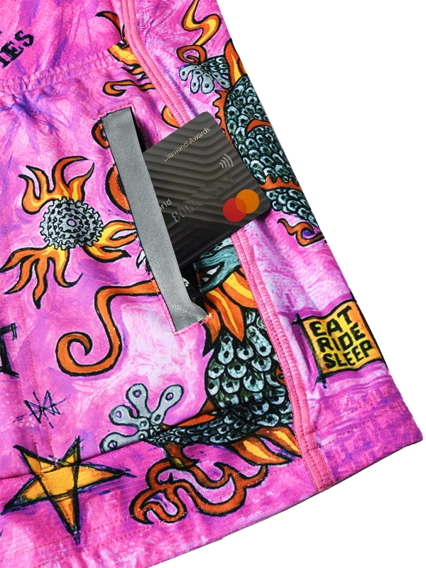 Pink long sleeve cycling jersey with colorful graphics and text, featuring a tiger design and 'Cycology' branding.