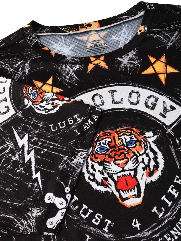 Close-up of a black tech t  shirt with tiger design and text