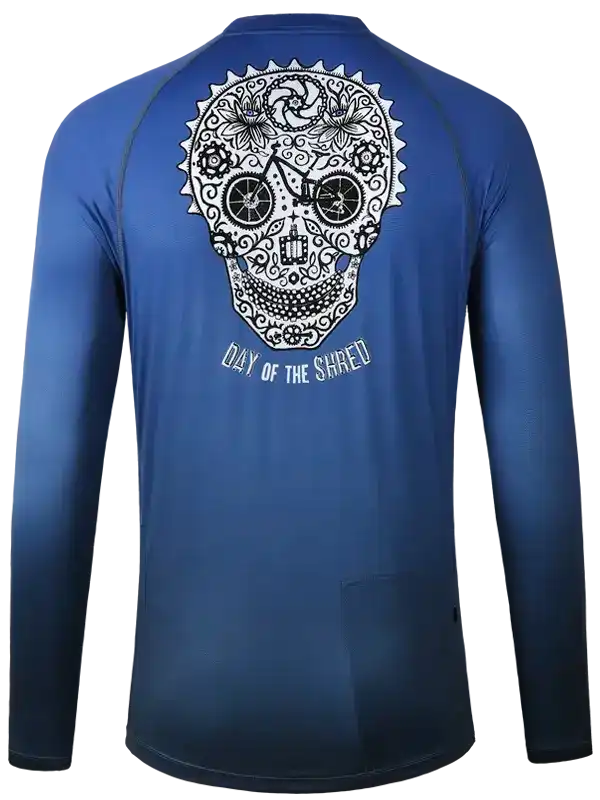 Blue long sleeve cycling jersey with sugar skull and 'Day of the Shred' graphic design