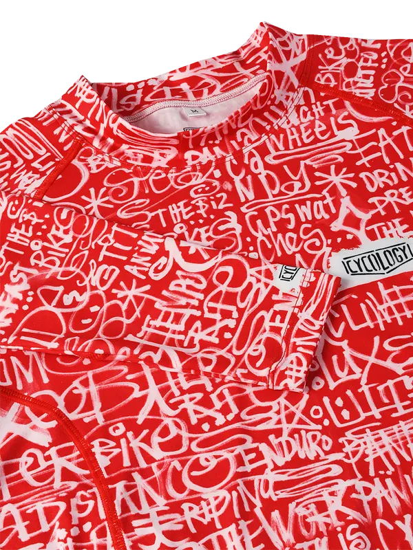 Red long-sleeve cycling base layer with white graphic design