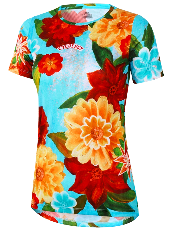 Women's colorful floral  technical t-shirt with red, yellow, and orange flowers on a aqua blue background