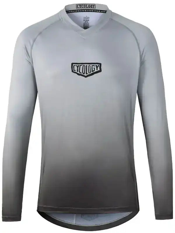 Men's long sleeve cycling jersey with gradient gray design and Cycology logo, ideal for road biking.