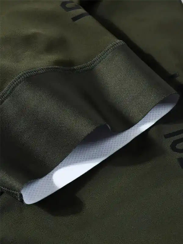 Olive green cycling shorts with padded chamois and breathable fabric for men and women