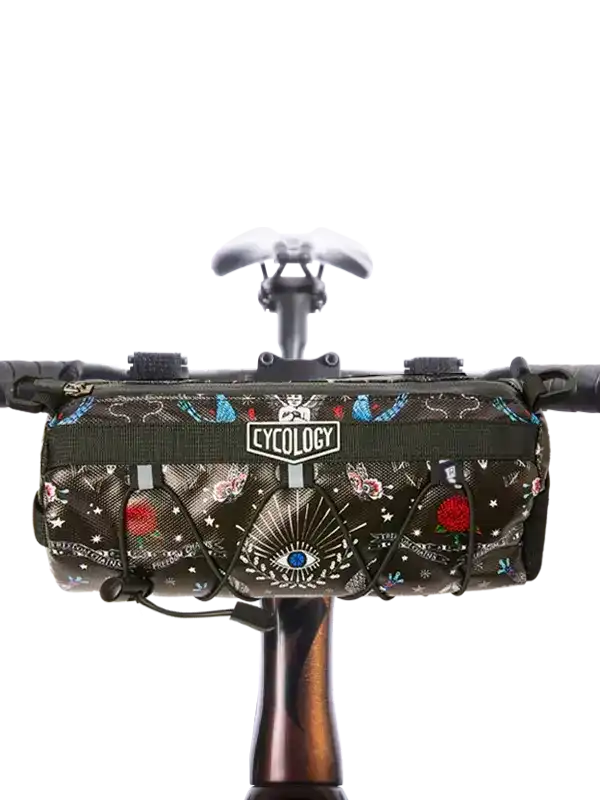 Cycology bike frame bag with eye and rose pattern, mounted on handlebars for cycling gear storage