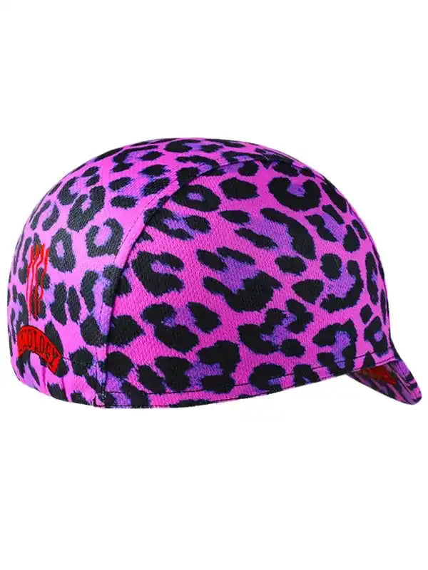 Pink leopard print cycling cap with black spots and red logo detail