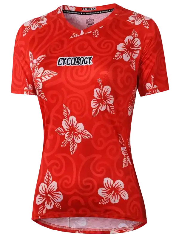 Red women's cycling jersey with white hibiscus floral pattern and swirl design, featuring brand logo