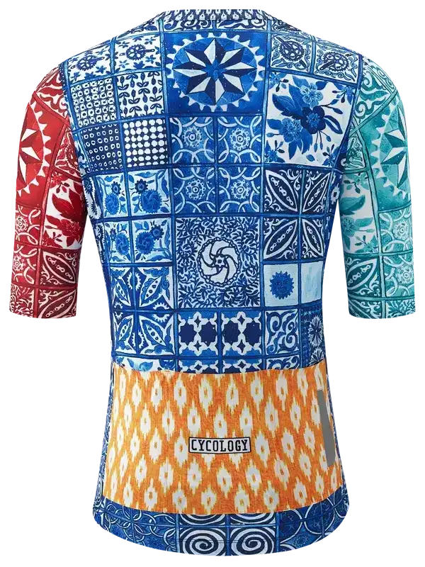 Men's cycling jersey with vibrant patchwork tile print, blue red teal orange, Cycology brand label