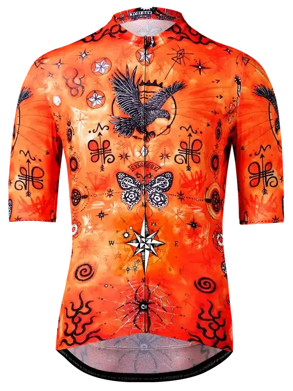 Vibrant orange cycling jersey with mystical designs, including a raven, butterfly, and compass, perfect for men's and women's rides.