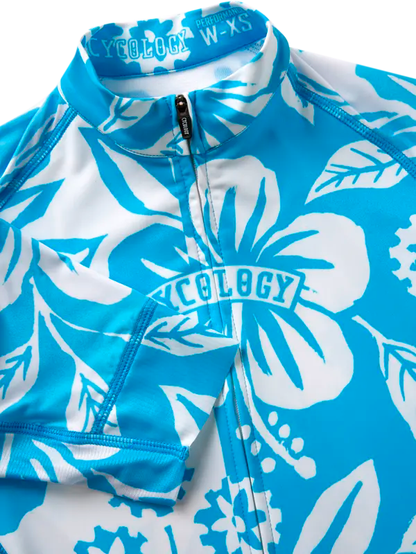Blue cycling jersey with white floral pattern on a white background