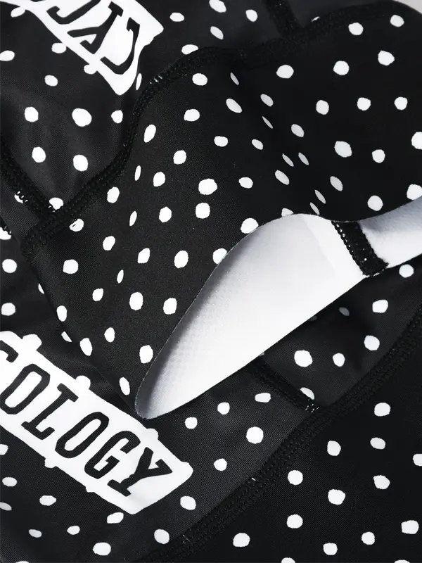 Black cycling bib shorts with white polka dot pattern with back zipper 