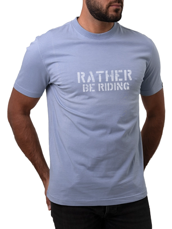 Light blue t-shirt with 'Rather Be Riding' text worn by a person 