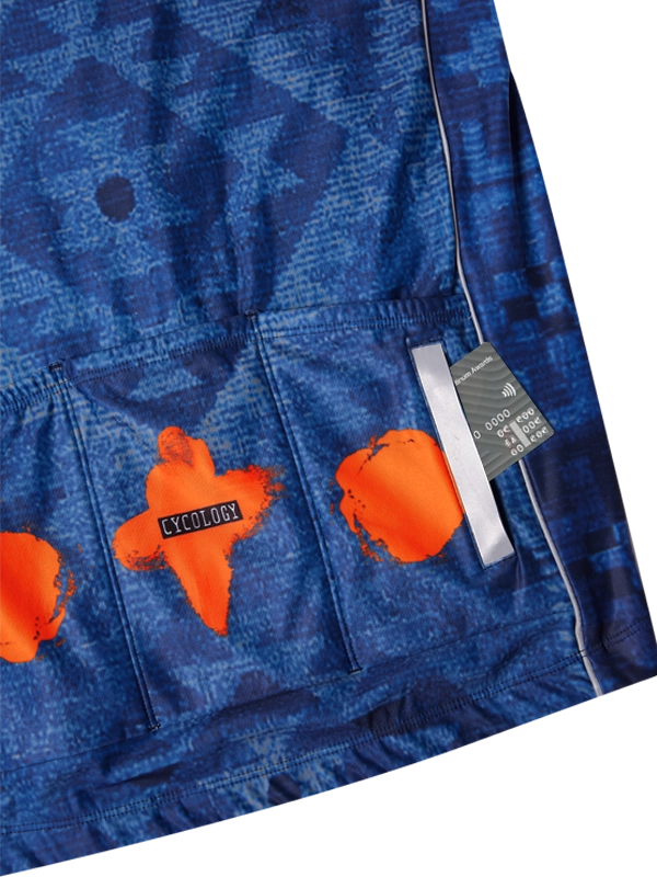 Blue jersey with orange patches on back pockets and a visible brand cycology logo