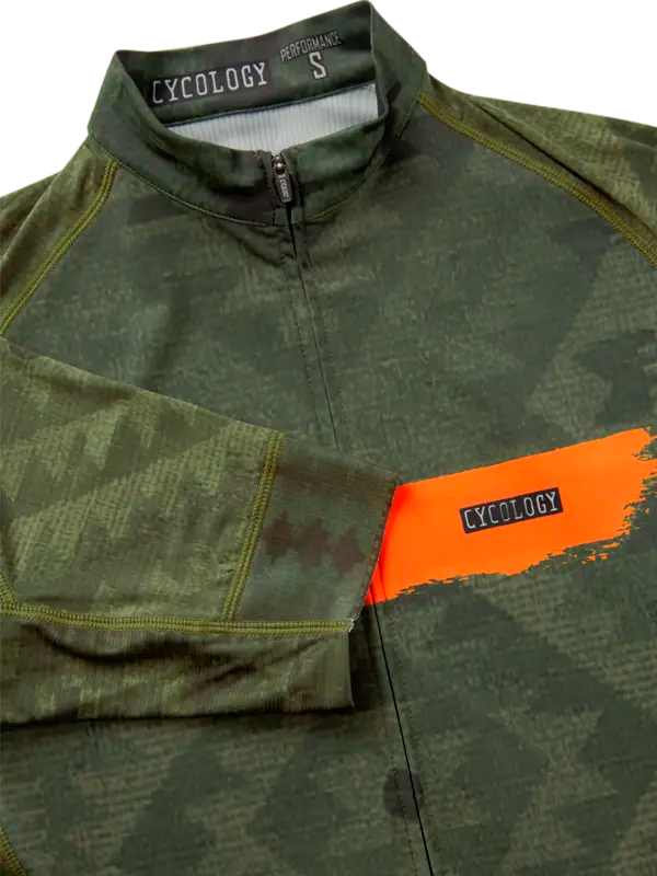 Green cycling jersey with orange stripe 