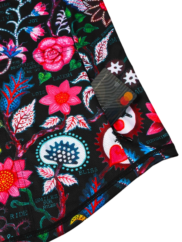 Colorful floral patterned fabric with a back zip pocket 