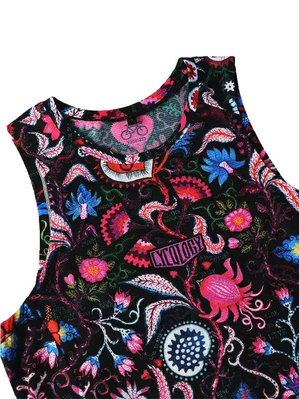 Women's cycling tank top with vibrant floral and abstract print on black fabric