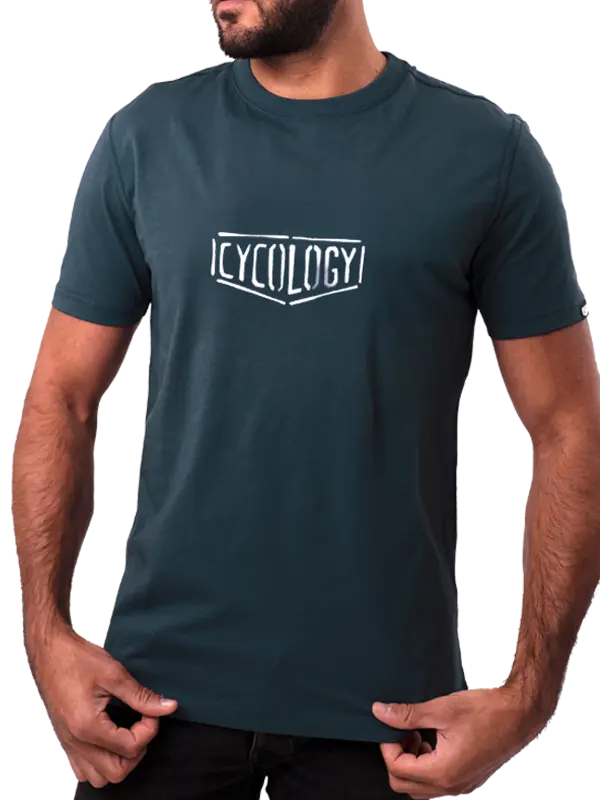 Person wearing a blue  t-shirt with 'Cycology' logo 