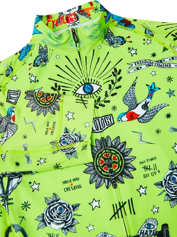 Green jersey with black and white graphic designs on a green background