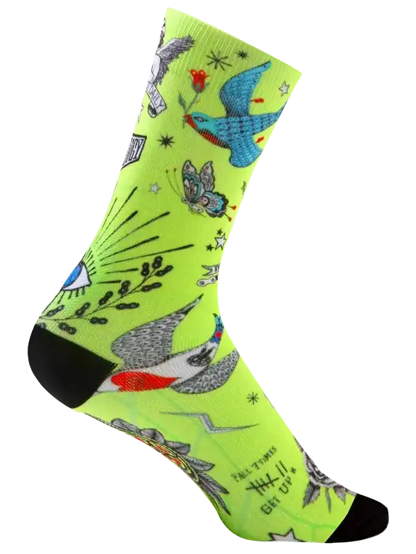 Vibrant neon green cycling socks with tattoo-style bird, butterfly, and star designs for men and women