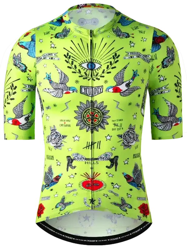 Vibrant green men's cycling jersey with tattoo-style birds, roses, and eye design for road biking