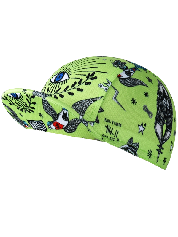 Green cycling cap with black and white pattern on a white background