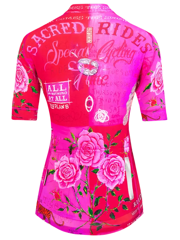 Pink cycling jersey with floral designs and text on a white background