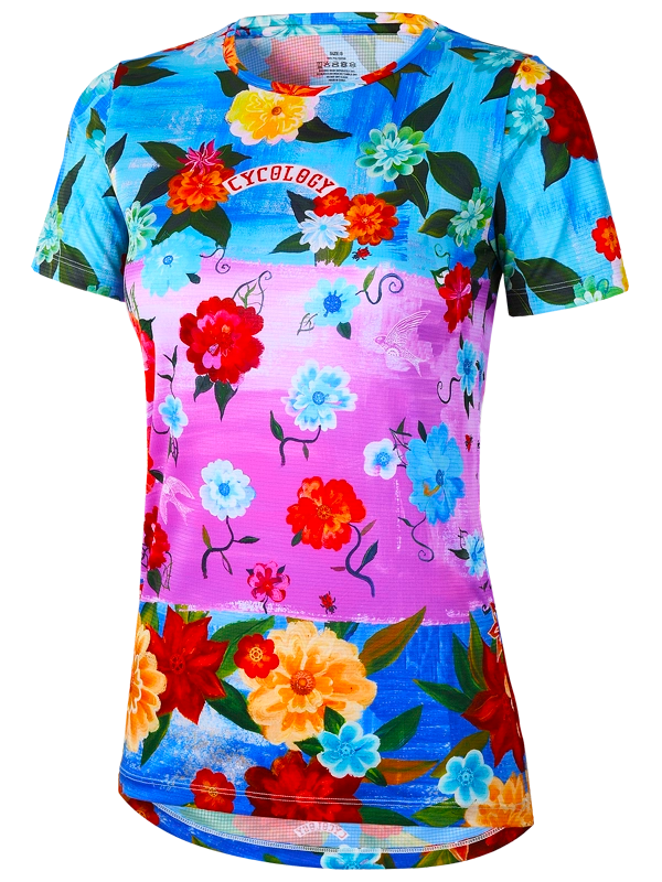 Colorful  pink and blue floral-patterned tech t shirt with a visible Cycology  brand logo 