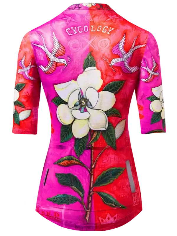 Women's cycling jersey with vibrant pink and red floral design, featuring white magnolia and birds, 3/4 sleeves
