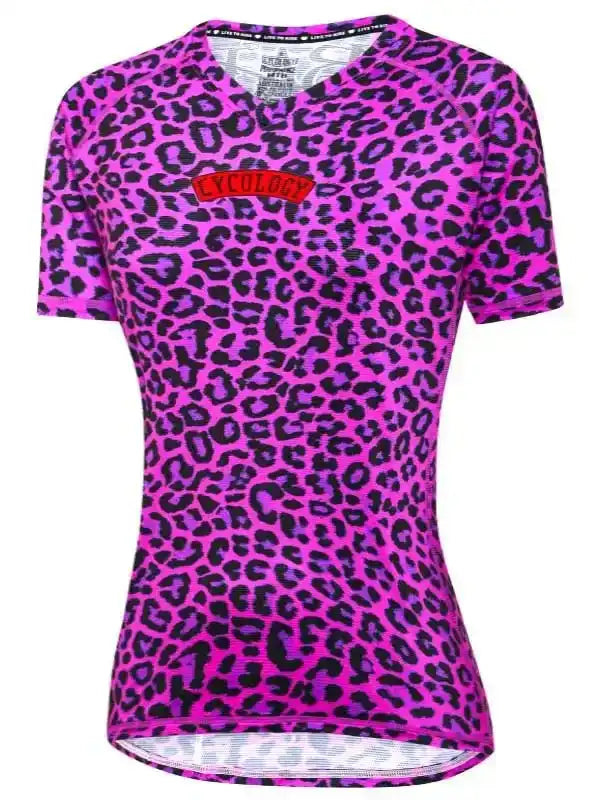 Women's pink leopard print cycling jersey with bold graphic design, perfect for road biking and fitness rides.