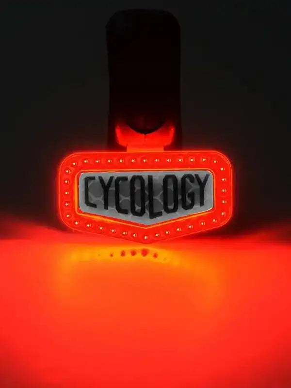 Cycology LED bike tail light with glowing red illumination for night cycling safety