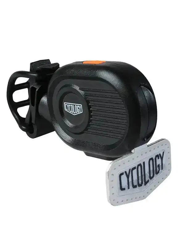 Cycology bike bell with black housing, orange button, and branded tag for cycling safety