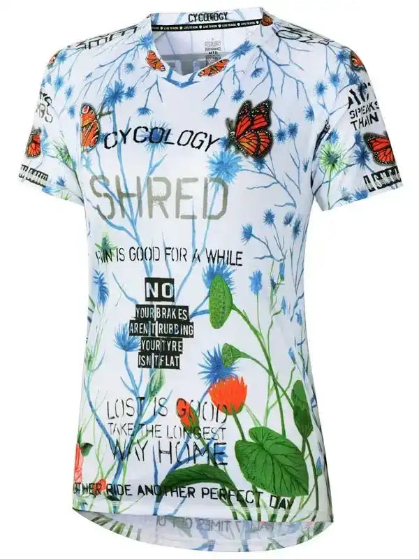 Women's cycling jersey with butterfly and floral print, bold text design, breathable fabric for bike rides