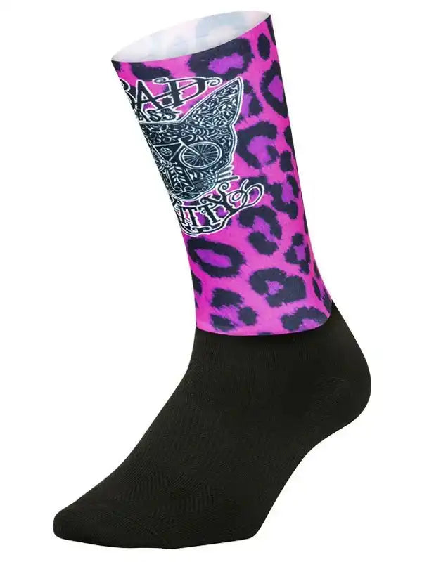 Pink leopard print cycling sock with skull design, ideal for men's and women's bike rides