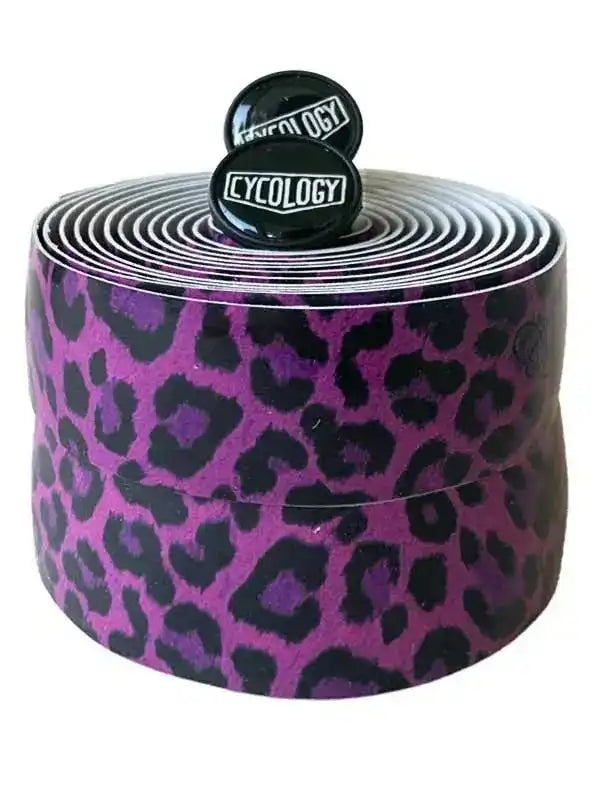 Purple leopard print bike handlebar tape with Cycology end plugs