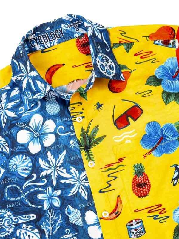 Men's tropical cycling shirt with pineapple, hibiscus, and sunglasses print on yellow and blue fabric