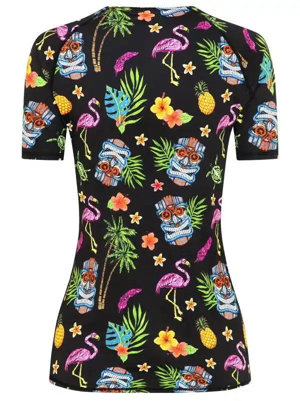 Women's tropical print cycling jersey with flamingos, pineapples, and tiki masks on black