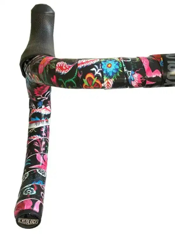Colorful floral bike handlebar tape with black grip, featuring vibrant patterns for cycling comfort